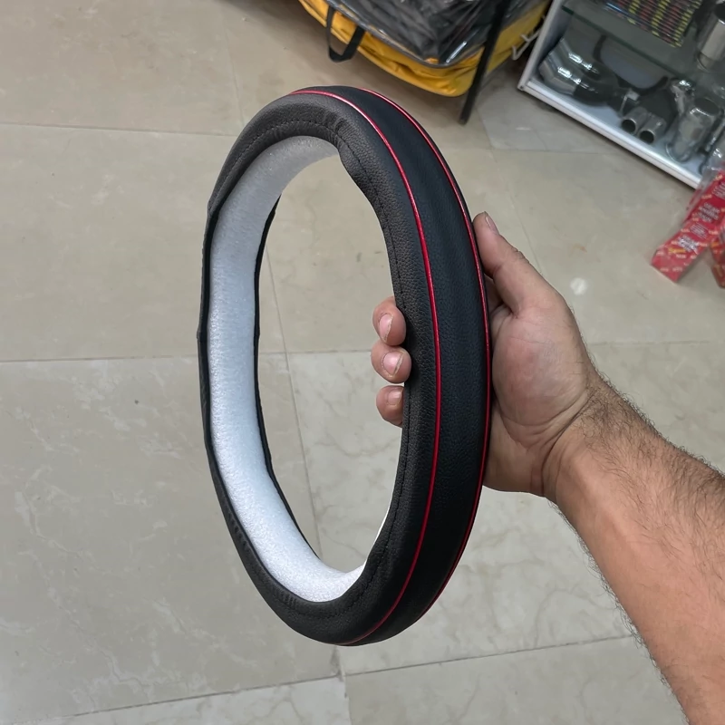دور فرمان حلقه ای چرمی مشکی با مغزی قرمز مناسب تمامی خودرو ها